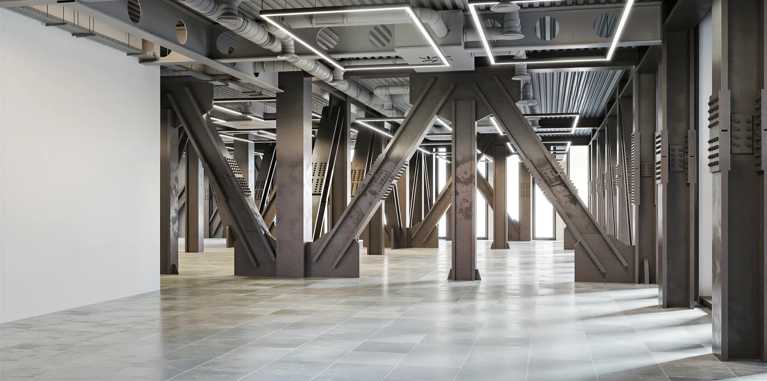 Industrial loft space with exposed steel beams, concrete columns, polished floors, and modern ceiling fixtures with natural light from windows.