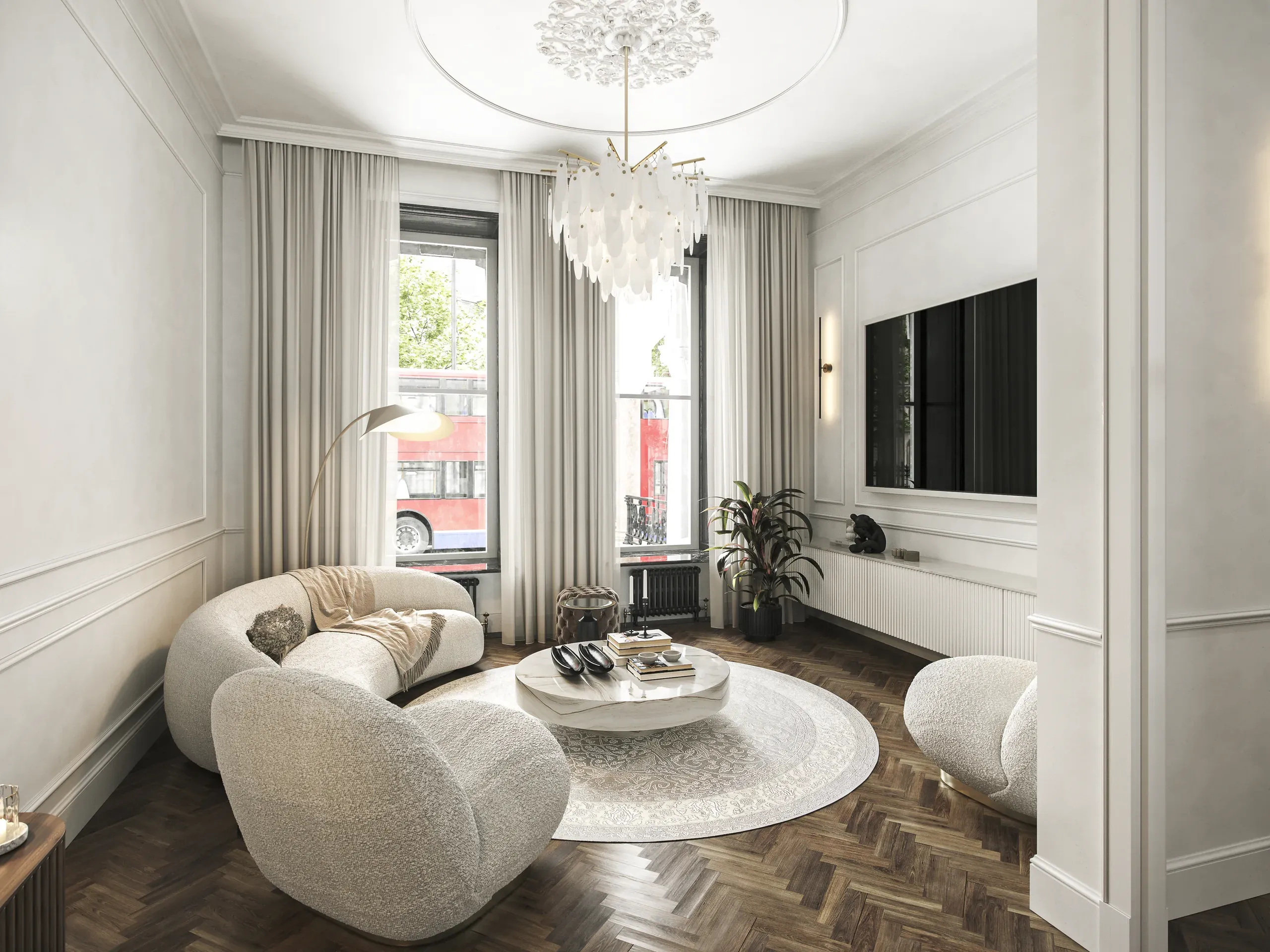 Modern living room with curved cream furniture, round white table, herringbone flooring, ornate ceiling medallion, and floor-to-ceiling windows with gray curtains.
