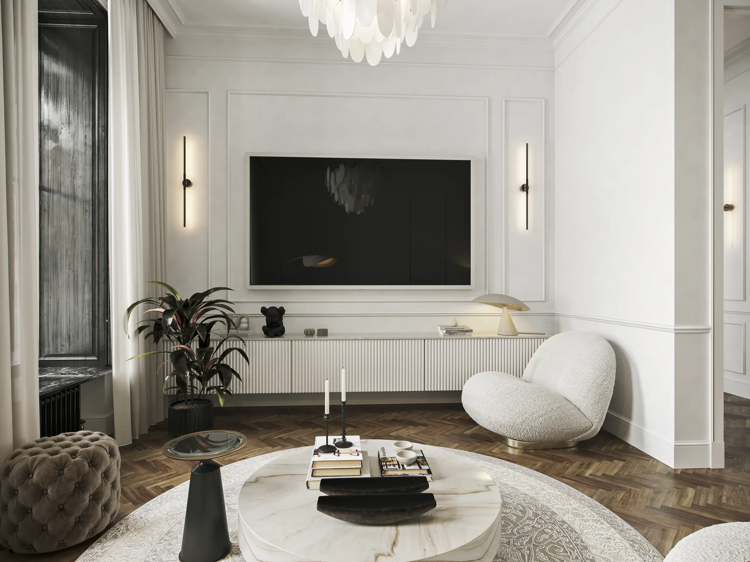 Modern living room with white walls, black TV, marble coffee table, cream armchair, herringbone flooring, and contemporary lighting fixtures.