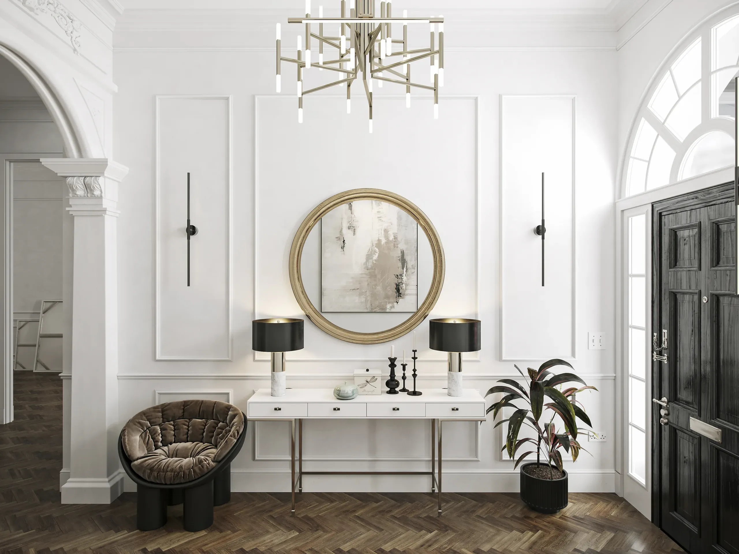 Modern entryway with white walls, round gold mirror, white console table with black pendant lamps, upholstered chair, potted plant, and dark wooden doors.