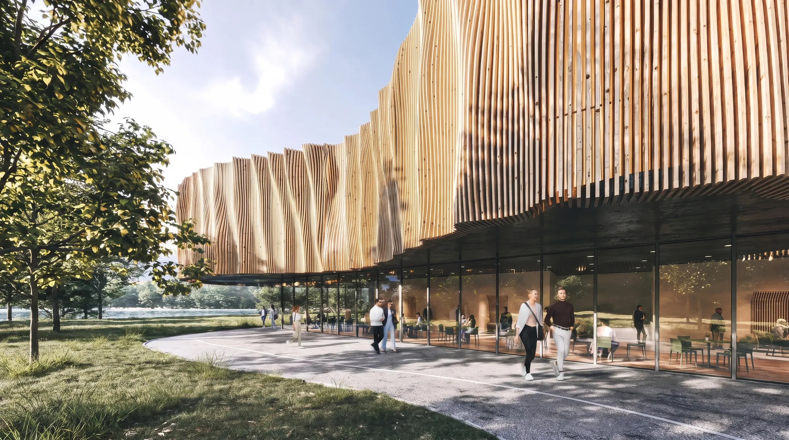 Modern wooden-slatted building with glass frontage overlooking a waterfront landscape, featuring an outdoor plaza with people and natural surroundings.