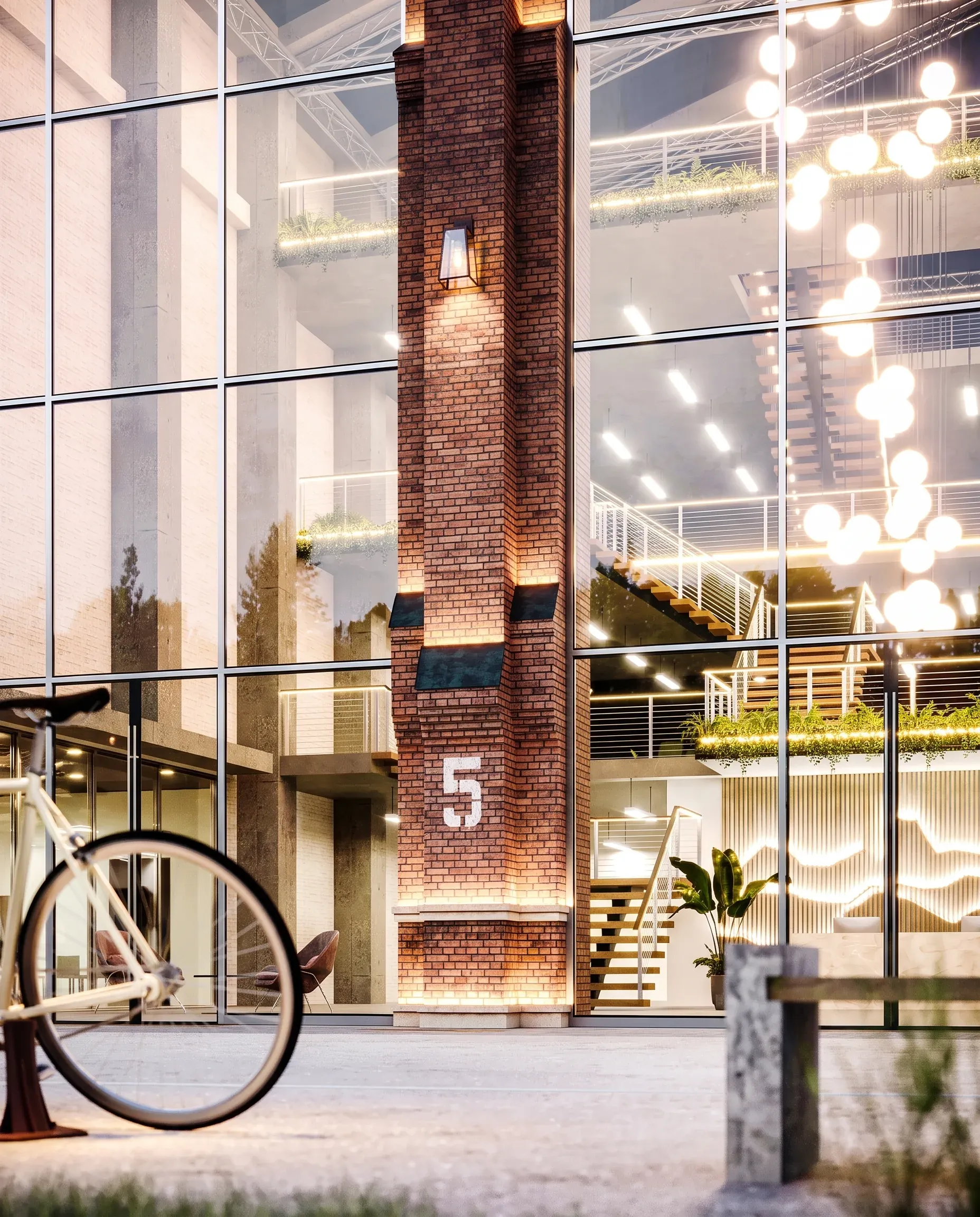 Modern building entrance at night with large glass windows, exposed brick chimney marked with number 5, bicycle in foreground, and illuminated street level.