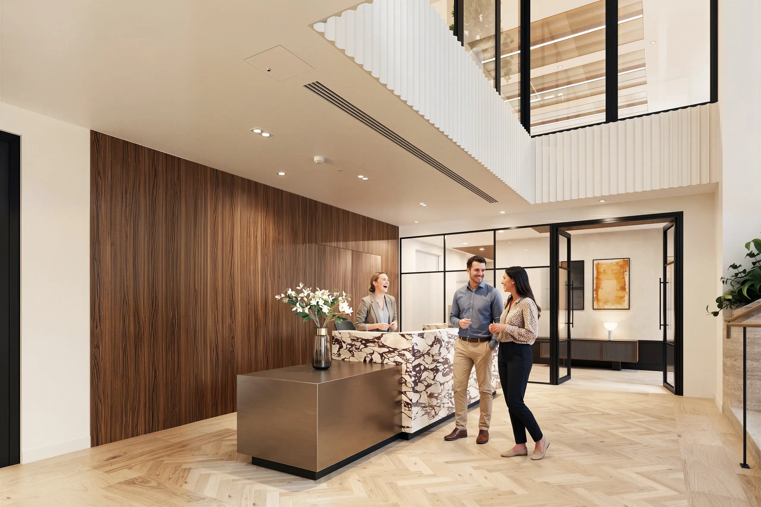 Modern office lobby with wood accent wall, reception desk, skylights, and three professionals interacting near glass-partitioned meeting rooms.