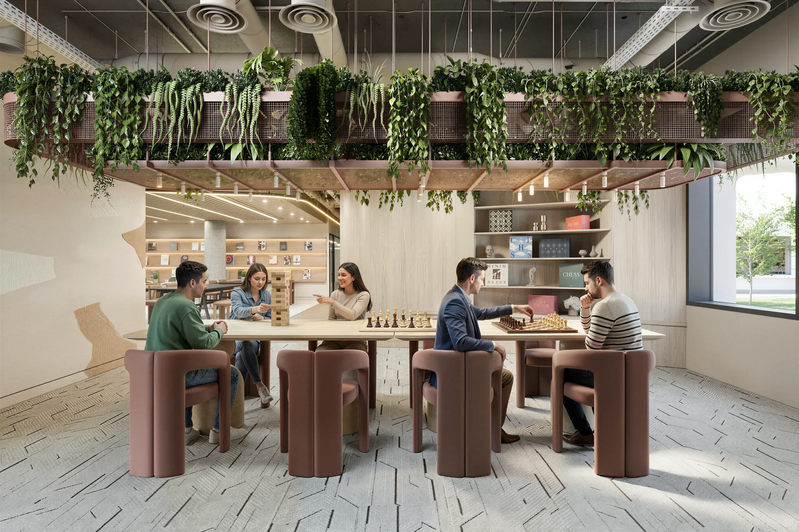 Modern office break room with people playing chess and socializing at tables, hanging plants overhead, wooden shelving, and natural lighting from large windows.
