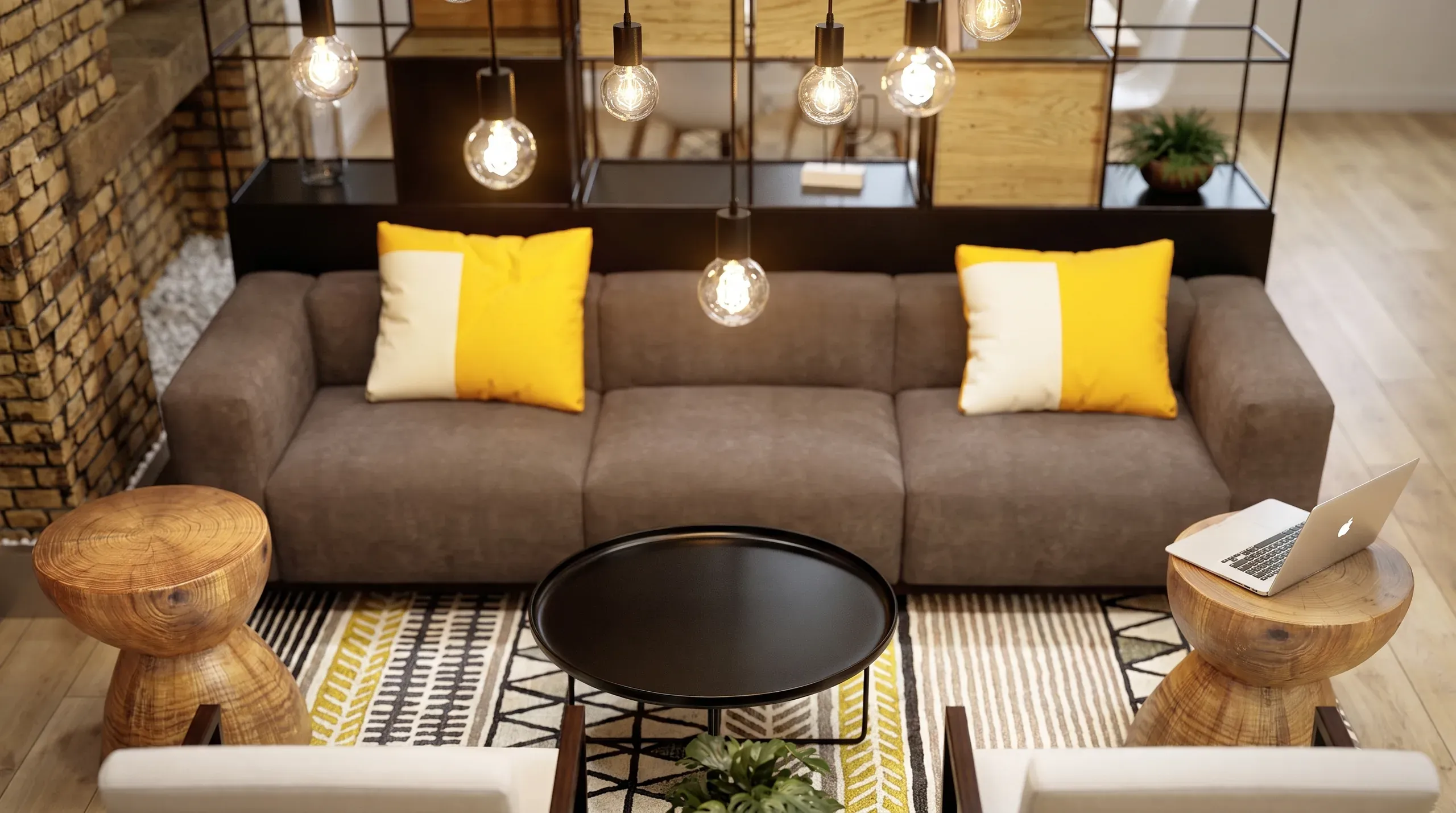 Modern living room with gray sofa, yellow and cream pillows, wooden side tables, black round coffee table, pendant lights, and geometric patterned rug.