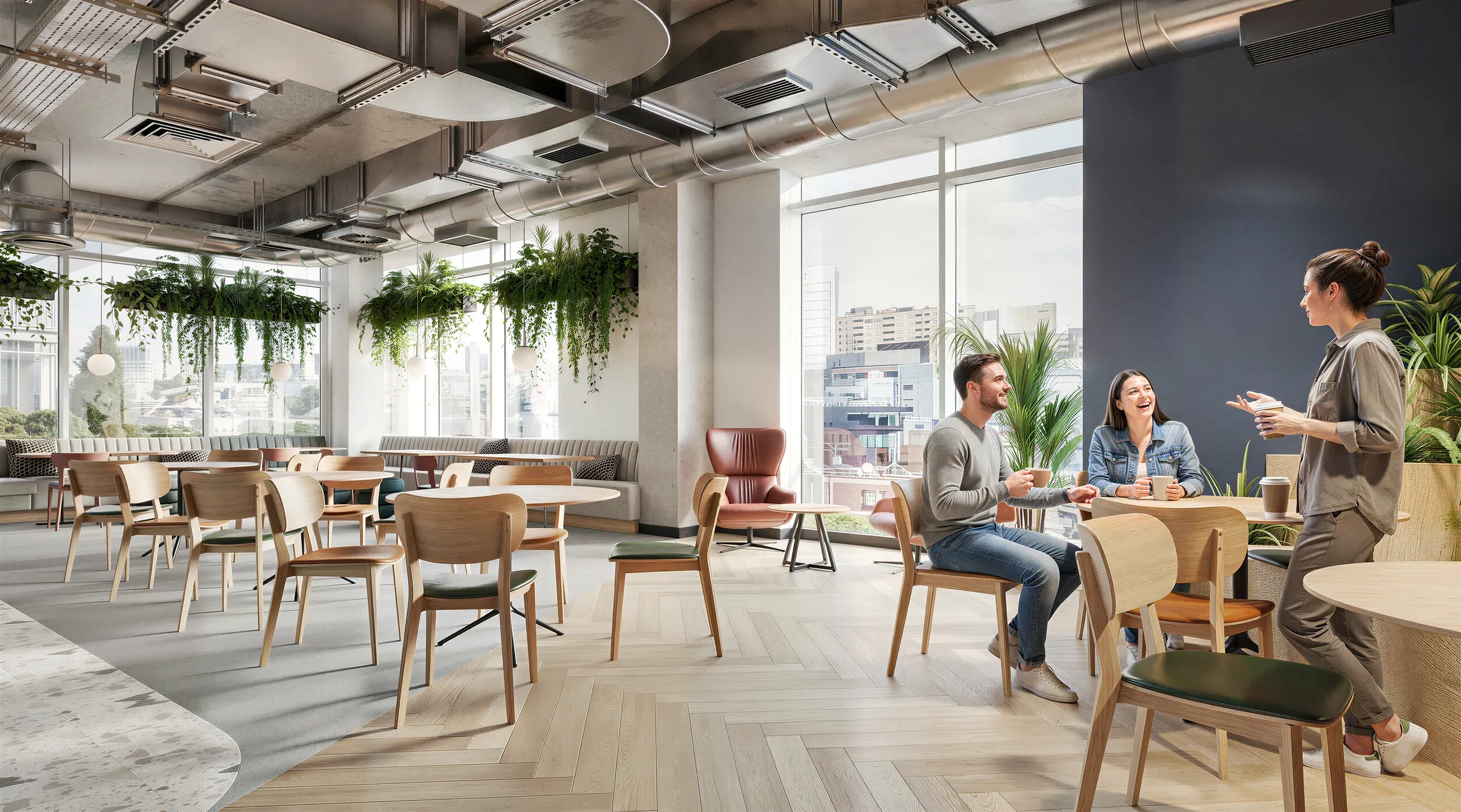 Modern open-plan office lounge with wooden furniture, hanging plants, floor-to-ceiling windows overlooking city skyline, and employees collaborating at tables.