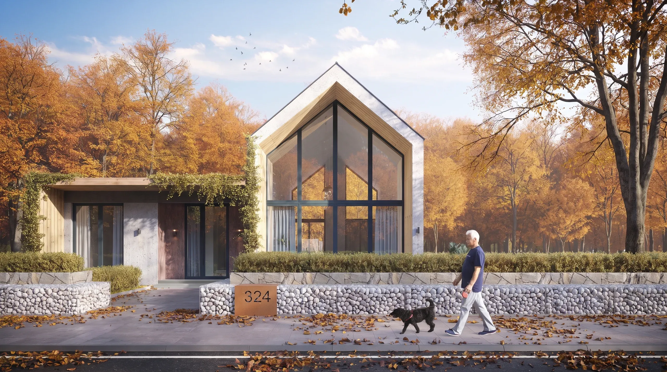 Modern house with large peaked roof and black-framed windows, white stone fence, autumn trees, person walking dog on street, house number 324.