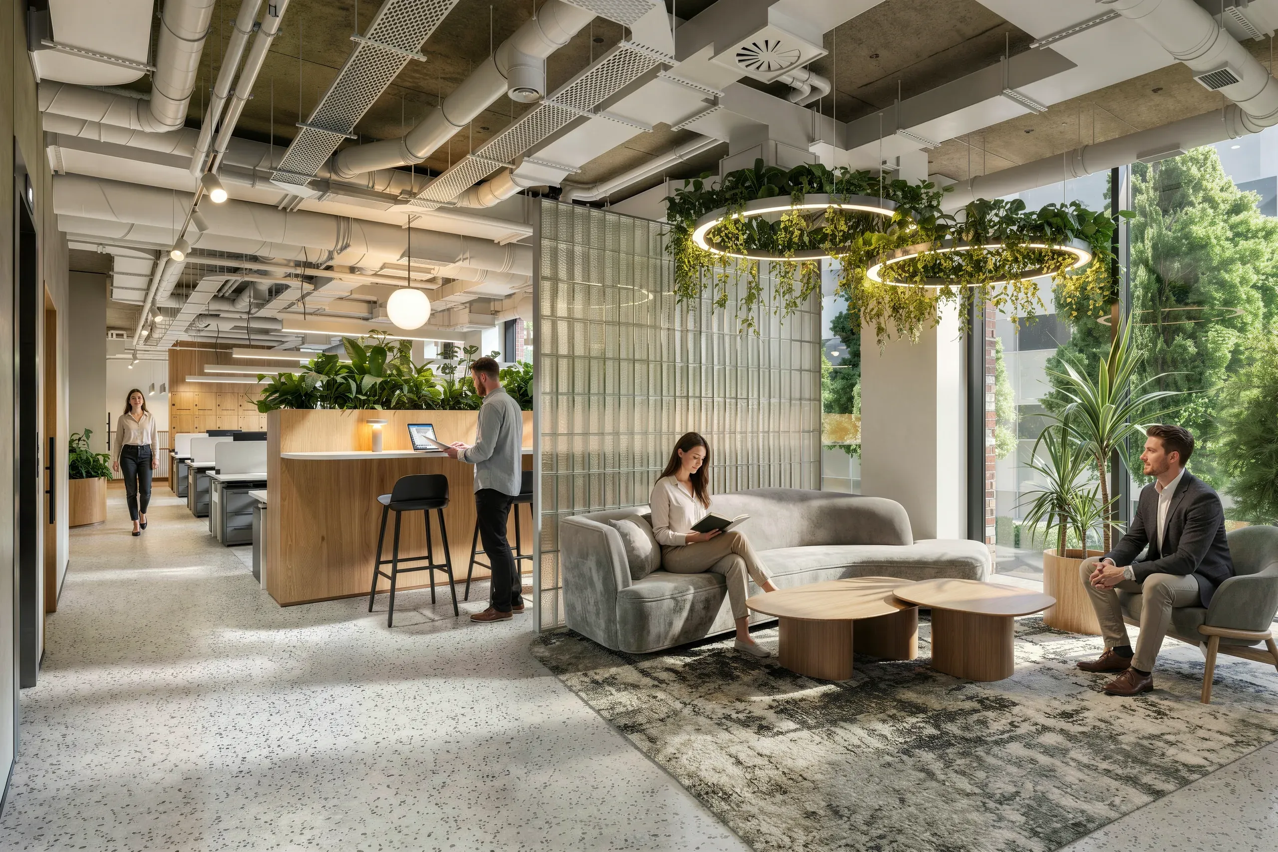 Modern office lobby with reception desk, lounge seating, hanging plant installations, and employees working in an open-plan workspace with floor-to-ceiling windows.