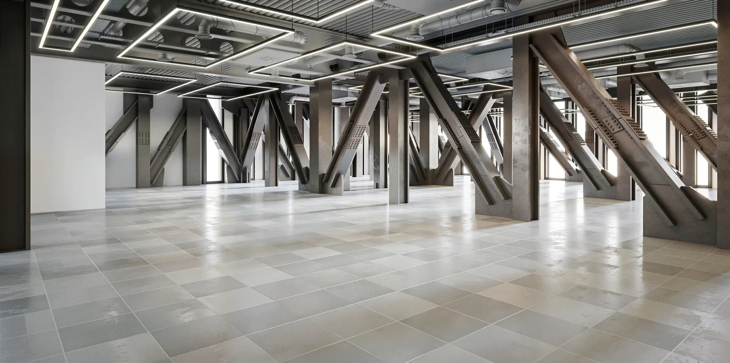 Empty industrial loft space with exposed concrete support beams, polished floor, and linear ceiling lights.