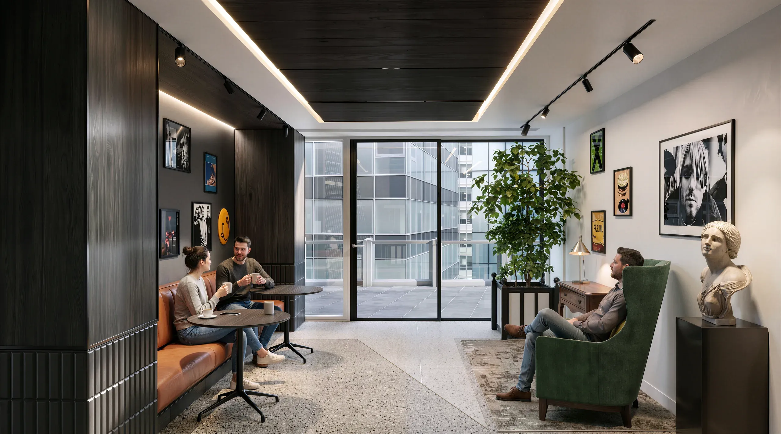 Modern office lounge with seated employees, orange and green seating, dark wood accents, floor-to-ceiling windows, planted greenery, and contemporary wall art.