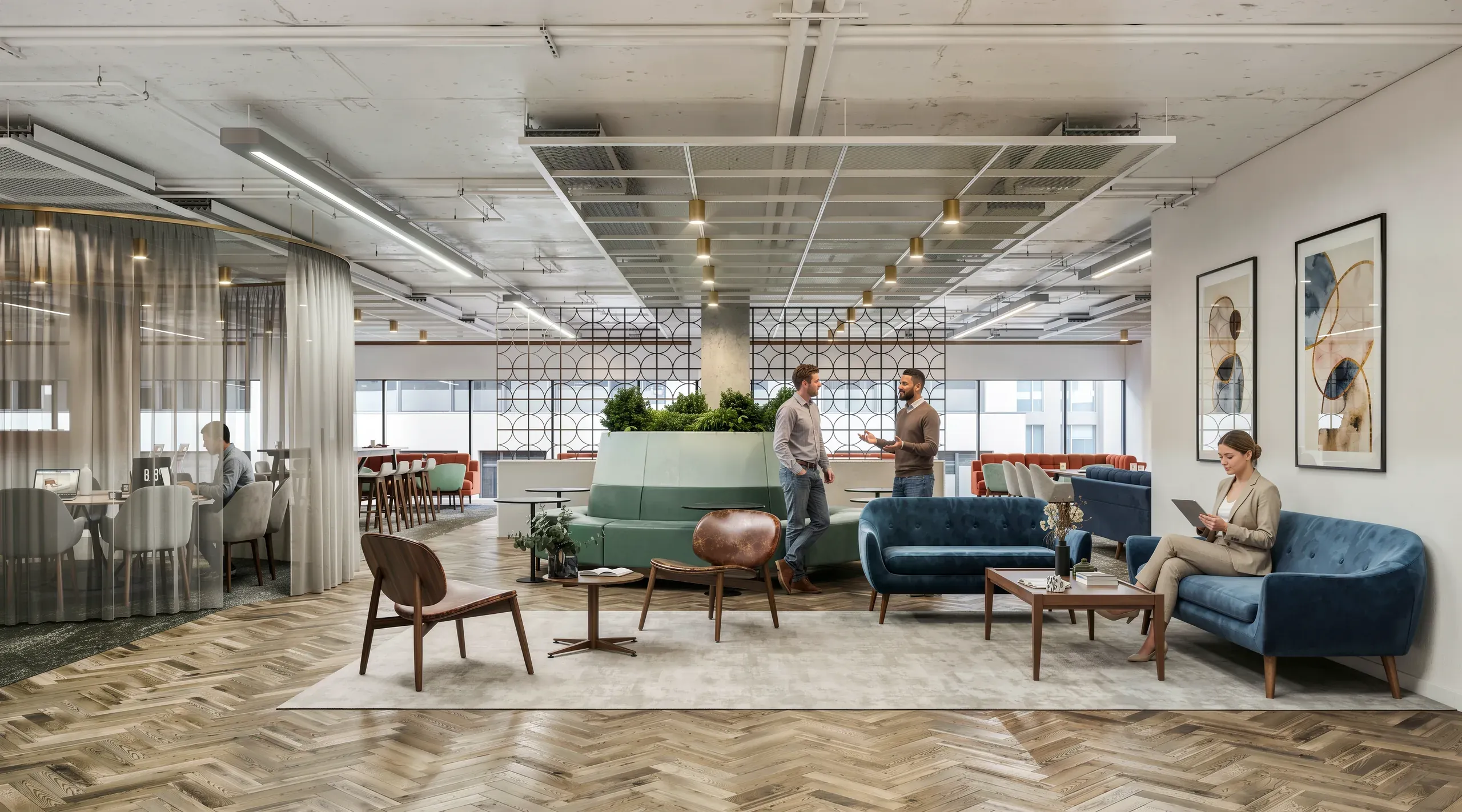 Modern open-plan office lounge with blue seating, wooden furniture, green plant dividers, and multiple employees collaborating in contemporary workspace.