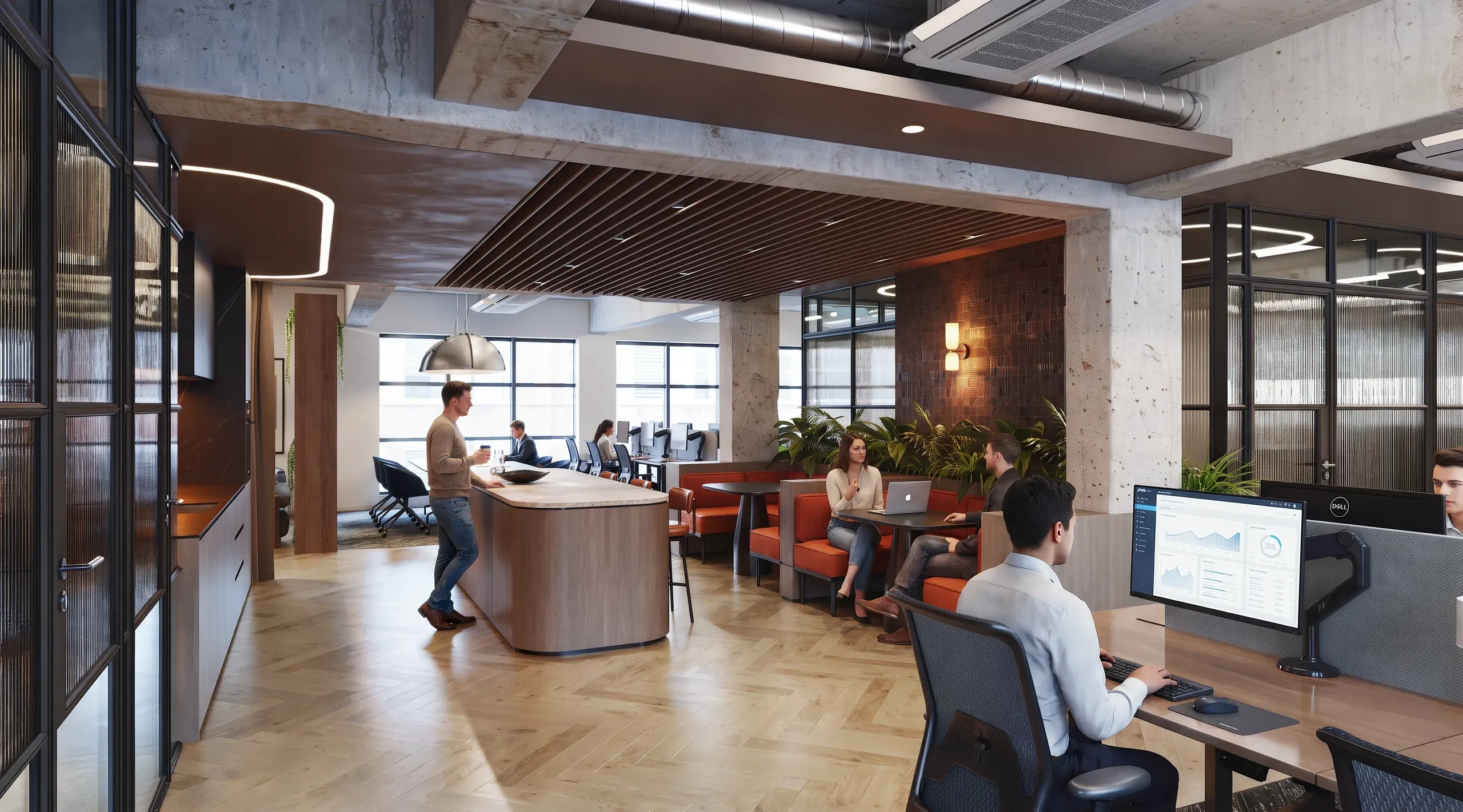 Modern open-plan office space with wooden flooring, concrete beams, collaborative seating areas with orange cushions, individual workstations, and large windows providing natural light.