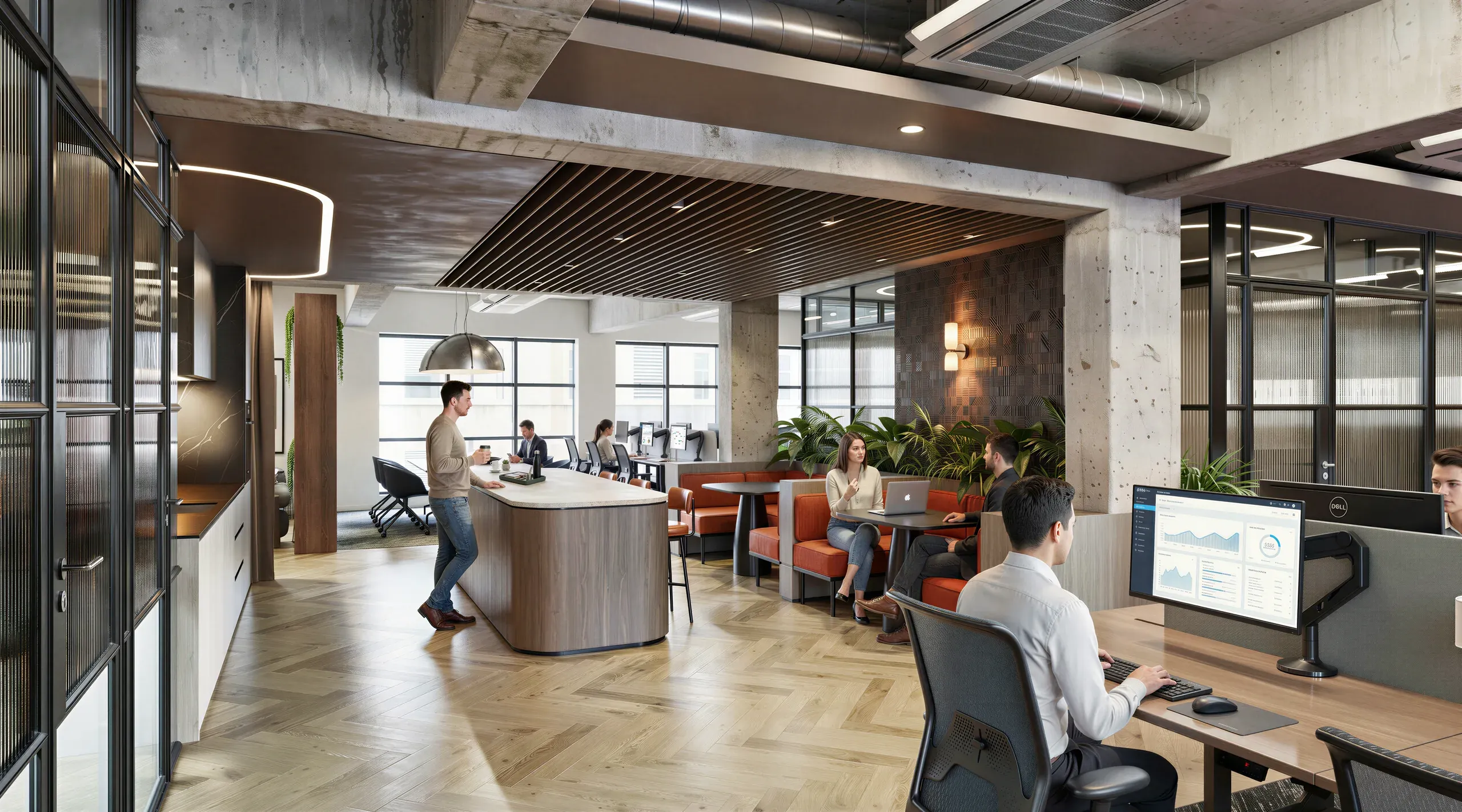 Modern open-plan office space with exposed concrete ceiling, wooden flooring, individual workstations, collaborative seating area with orange furniture, and glass-partitioned meeting rooms.
