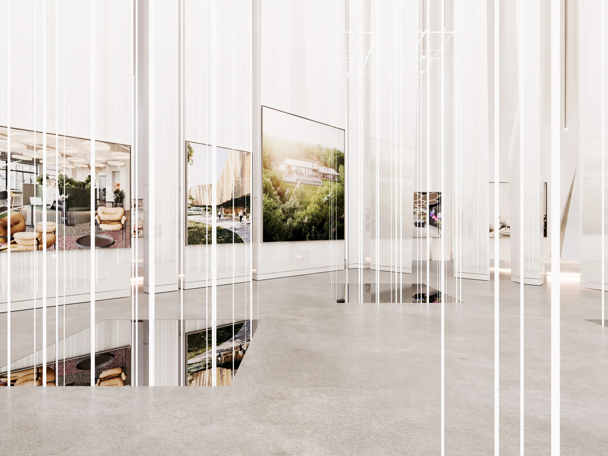 Modern gallery interior with floor-to-ceiling glass partitions, polished concrete flooring, and architectural renderings displayed on walls showing residential landscape designs.