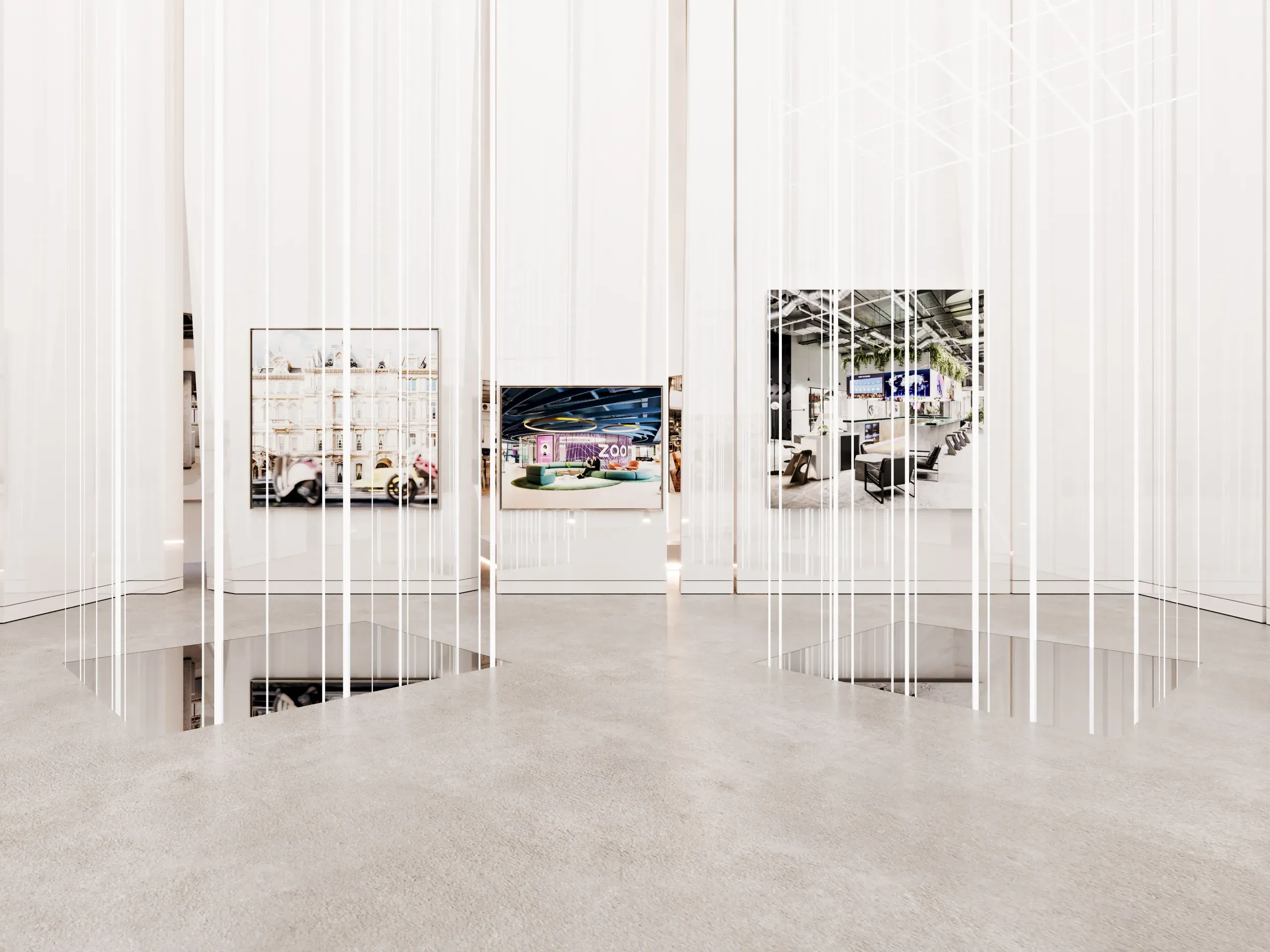 Modern art gallery interior with white walls, polished concrete floor, vertical white columns, and framed photographs displayed on walls.
